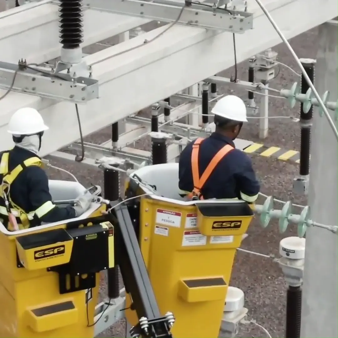Engetecnica team in an aerial basket at the substation
